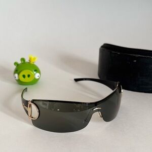 Gucci Black and Gold Rimless Sunglasses